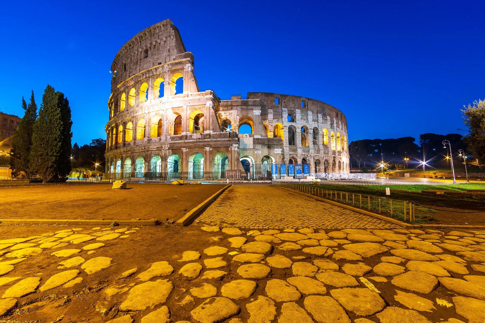 The Colosseum lit at dusk